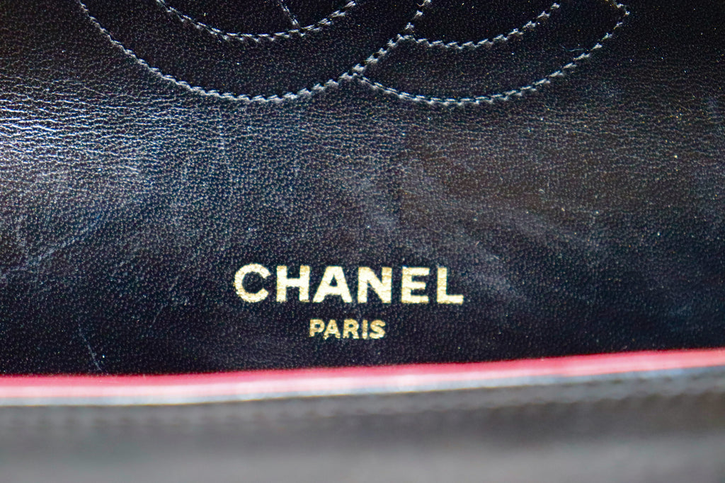 Rare vintage, 1970s, authentic Chanel trapezoid, black leather
